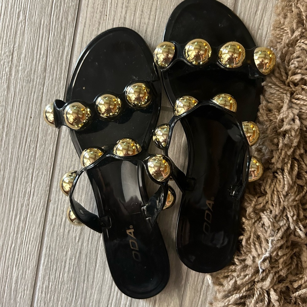 Black and gold sandals